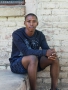 Aberdeen, South Africa. 2015. Vuyisa Maqabangqa (20) finished matric and wanted to study law, but he now looks after his younger brother. "My mother died a few weeks before I wrote matric and after that, things fell apart at home."